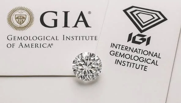 Lab-grown diamond being checked against independent grading documentation.