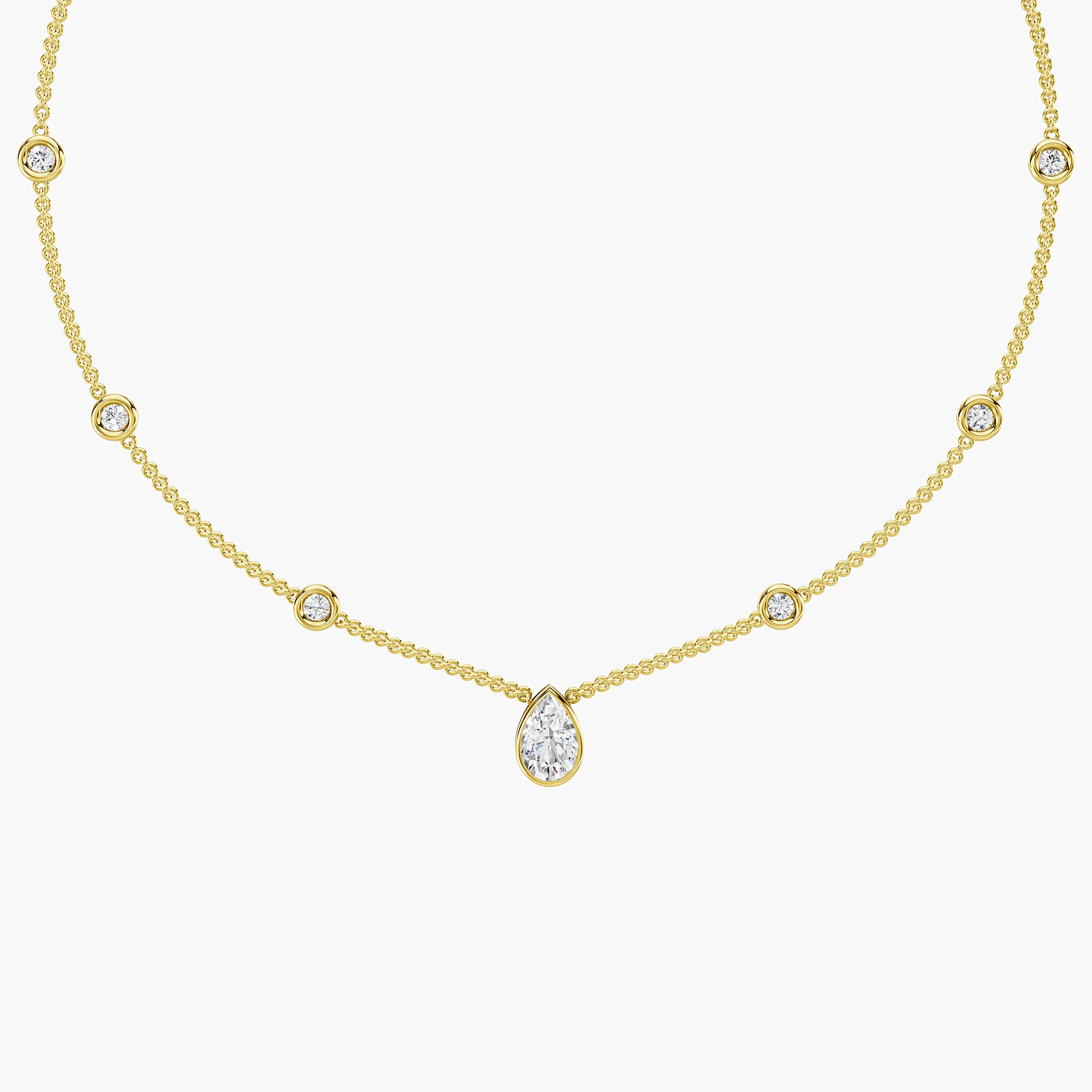 Pear-shaped diamond drop necklace with six round diamond stations spaced along a delicate chain.