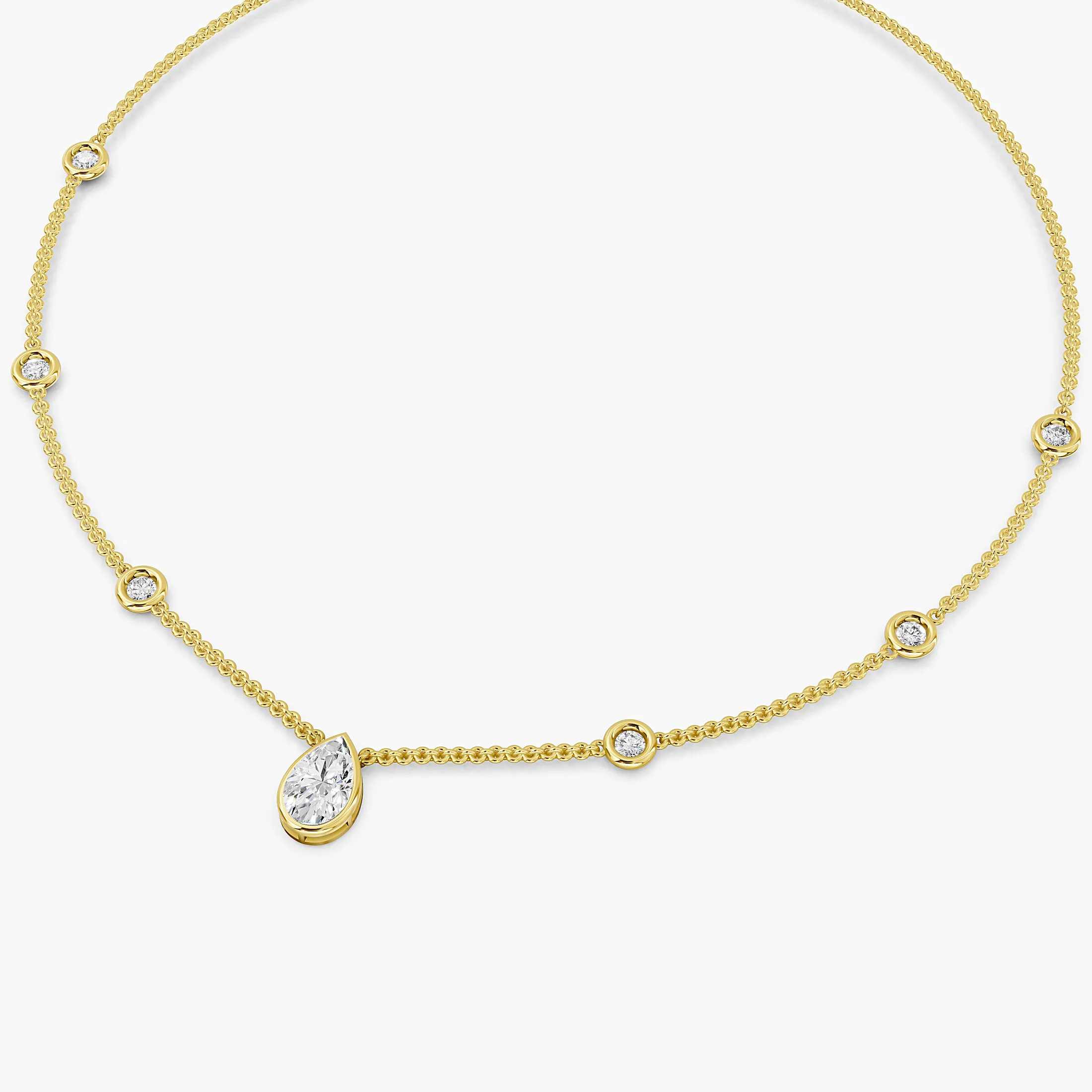 Pear-shaped diamond drop necklace with six round diamond stations spaced along a delicate chain.